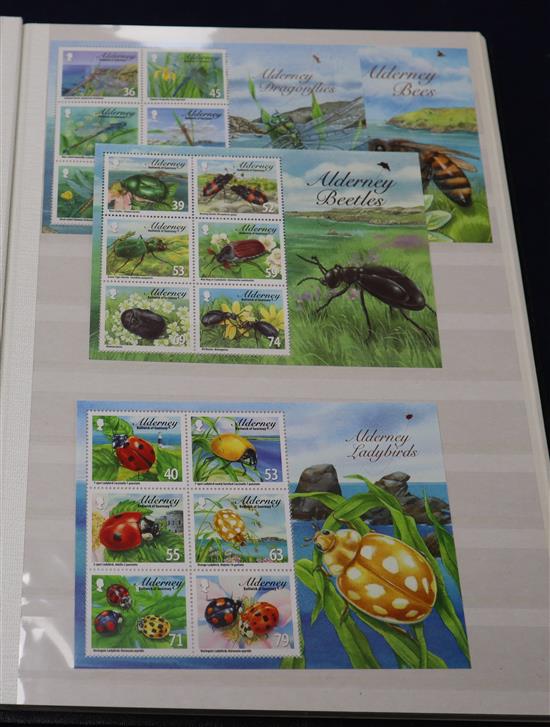 A collection of UK and Channel Island First Day covers sheets of stamps and unused stamps